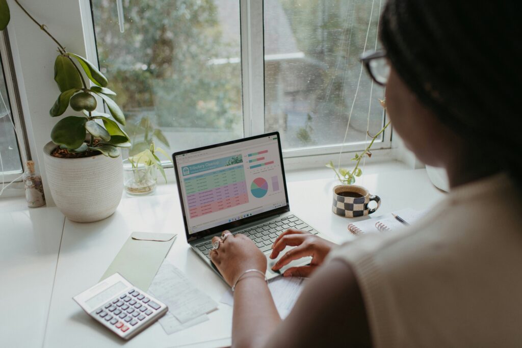 Reverse budgeting : Lady doing budgeting on laptop